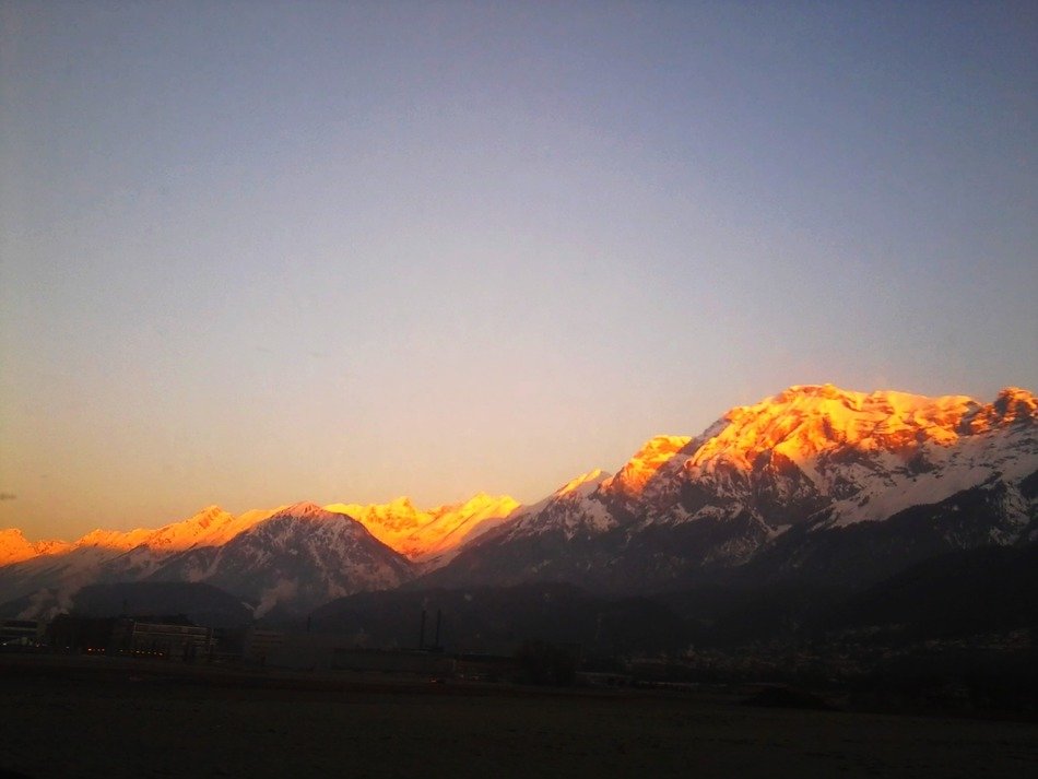 yellow sunlight on the mountain tops