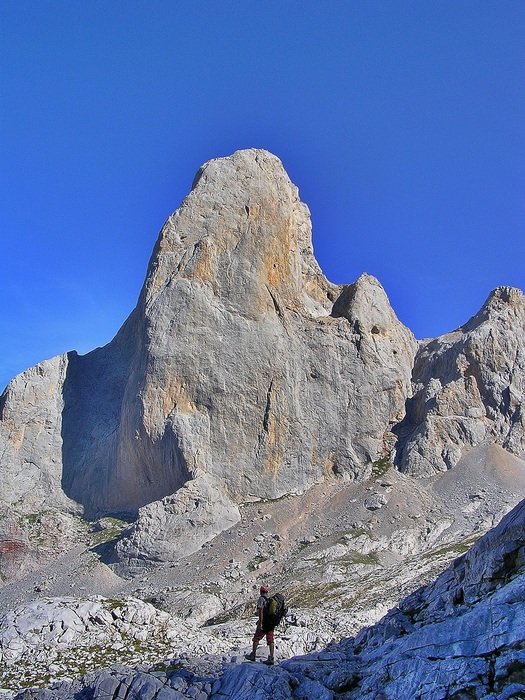 mountaineering, man with backpack at scenic peaks, asturia