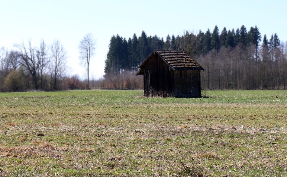 barn in the middle of the field