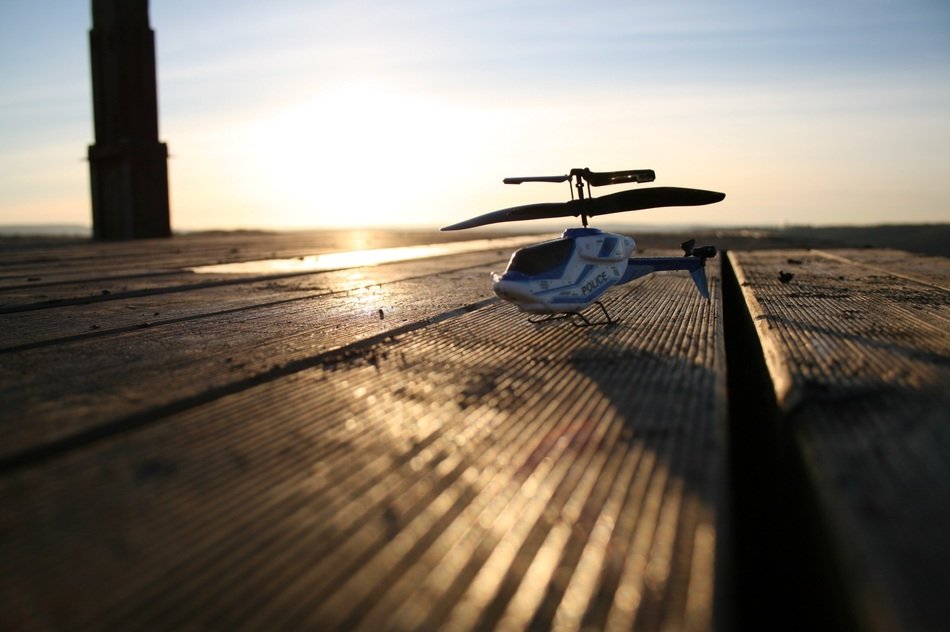 Mini helicopter under sunset