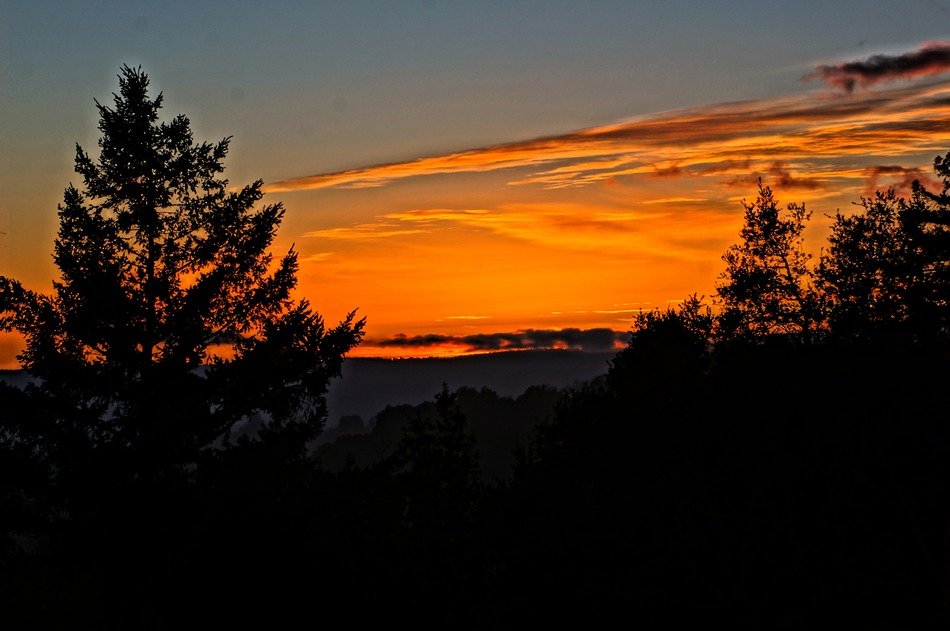panorama of orange sunset over the valley