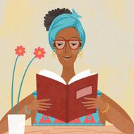 woman of African ethnicity reading