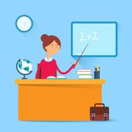 Education concept - teacher sitting at the table