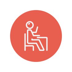 Student sitting on a chair in front of his table N6