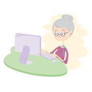 Happy Old Woman Using Computer