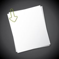 Arrow shaped paper clip pointing towards text