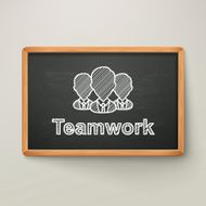 teamwork on blackboard in wooden frame