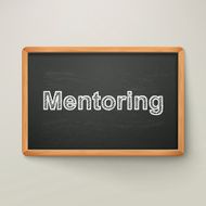 mentoring on blackboard in wooden frame