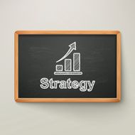 strategy on blackboard in wooden frame