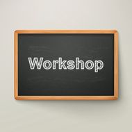 workshop on blackboard in wooden frame