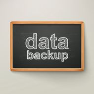 data backup on blackboard in wooden frame