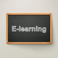 e-learning on blackboard in wooden frame