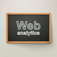 web analytics on blackboard in wooden frame