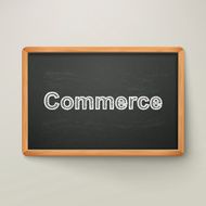 commerce on blackboard in wooden frame