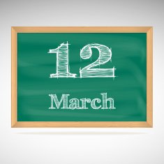 March 12 inscription in chalk on a blackboard