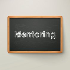 mentoring on blackboard in wooden frame