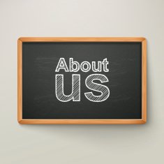 about us on blackboard in wooden frame