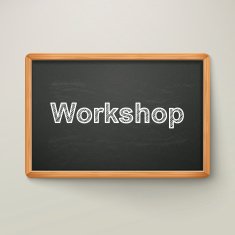 workshop on blackboard in wooden frame