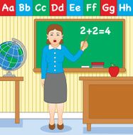 teacher standing at the blackboard