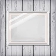 Picture frame template with white border on a wooden wall