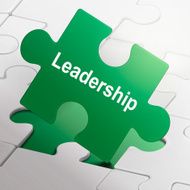 leadership word on green puzzle pieces