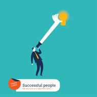 Businessman with megaphone catching a bulb