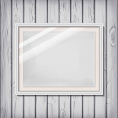 Picture frame template with white border on a wooden wall