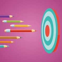 Colored pencils flying at the target