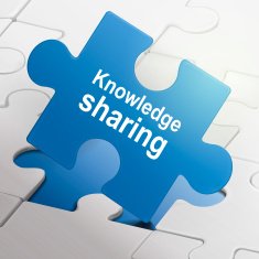 knowledge sharing on blue puzzle pieces