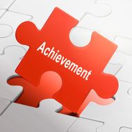 achievement word on red puzzle pieces