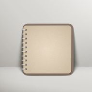 open blank brown notebook over grey N2