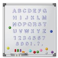 White board with colored markers and handrawn alphabet