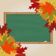 Maple leaves and green chalkboard