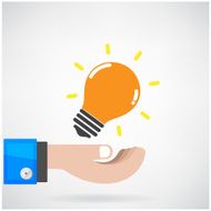 Creative light bulb Idea concept with businessman hand