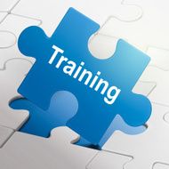 training word on blue puzzle pieces