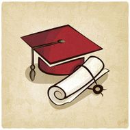 Graduation cap and diploma old background