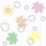 Multicolored maple leaves on a sheet of exercise book