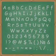 Chalked alphabet on a chalkboard background