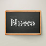 news on blackboard in wooden frame