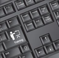 Computer keyboard with word &amp; training icon