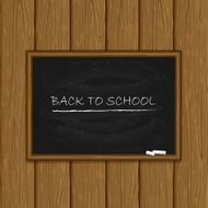 Black chalkboard on wooden background