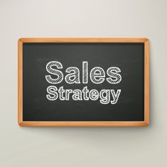 sales strategy on blackboard in wooden frame