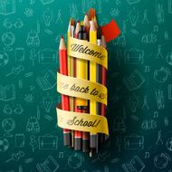 Colorful pencil crayons with text Back to school on ribbon N2