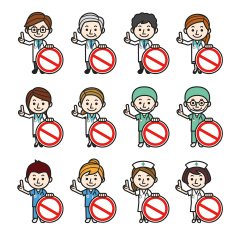 Health care workers showing a prohibition sign