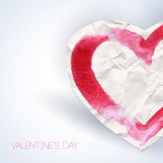 Paper heart with watercolor stroke on white backdrop