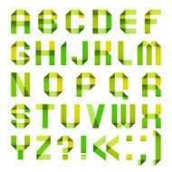 Spectral letters folded of paper ribbon-green and yellow