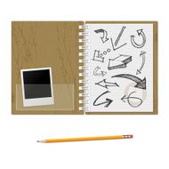 arrows sketched notebook with pencil