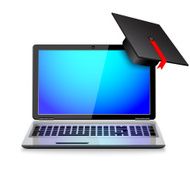 Graduation cap on laptop