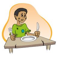Child sitting with hunger the table N2