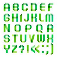 Spectral letters folded of paper ribbon-green